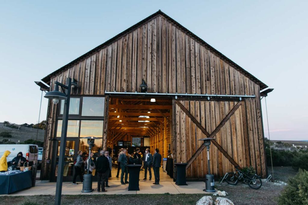 People are gathering at the event hosted at the Hay Barn.